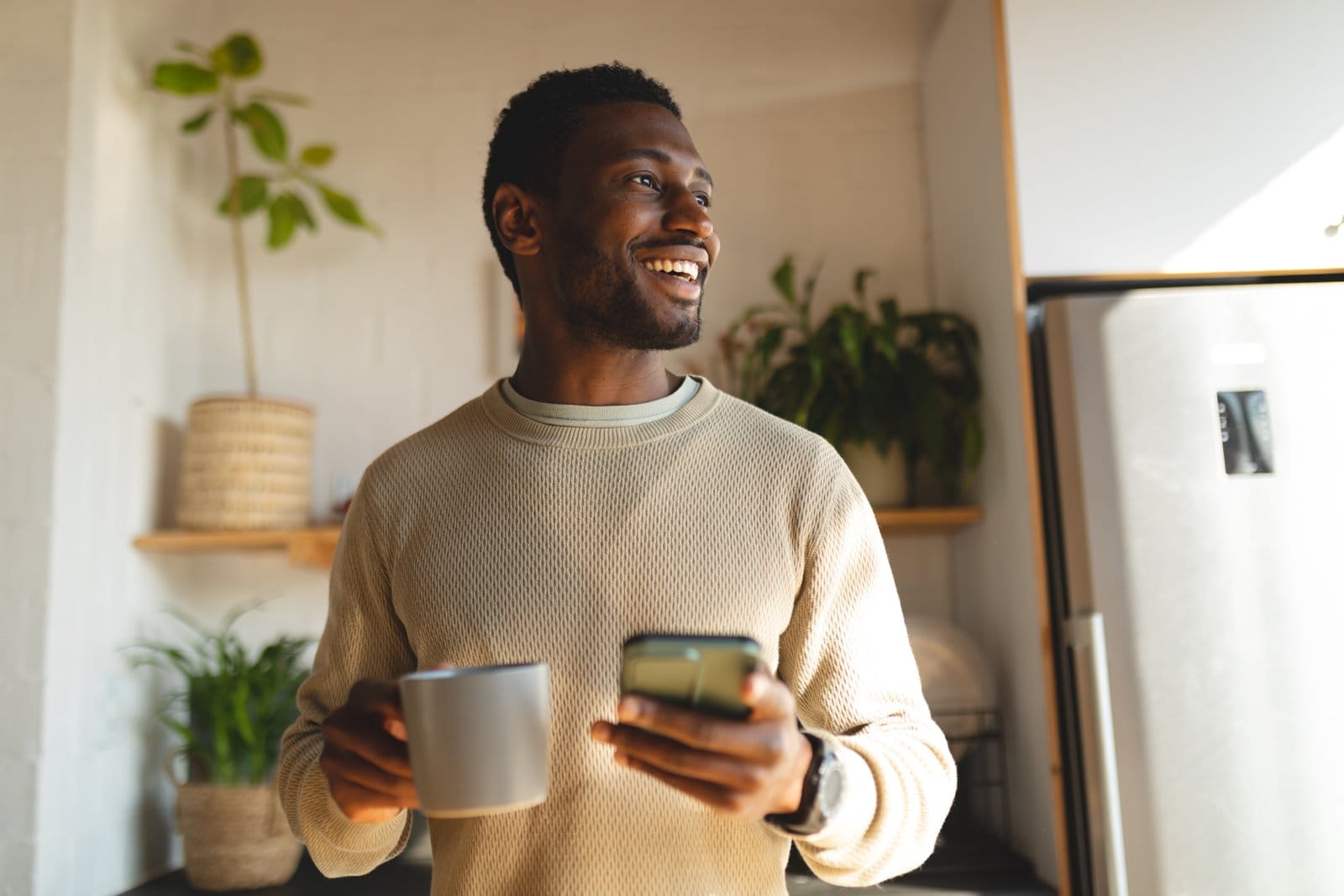 man smiling after he's booked a boiler service